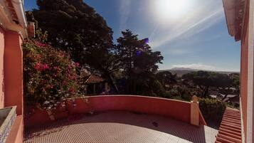 Enjoy breathtaking views of the surrounding landscape from this outdoor space.