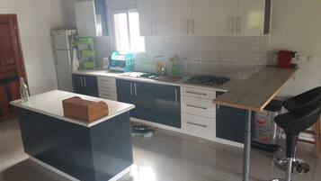 Bungalow, 2 Bedrooms, Non Smoking | Private kitchen | Full-sized fridge, microwave, stovetop, high chair