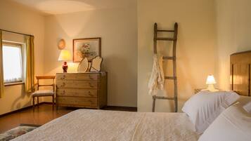 Apartment, 2 Bedrooms, Garden View (C5) | 1 bedroom, laptop workspace, iron/ironing board, cots/infant beds