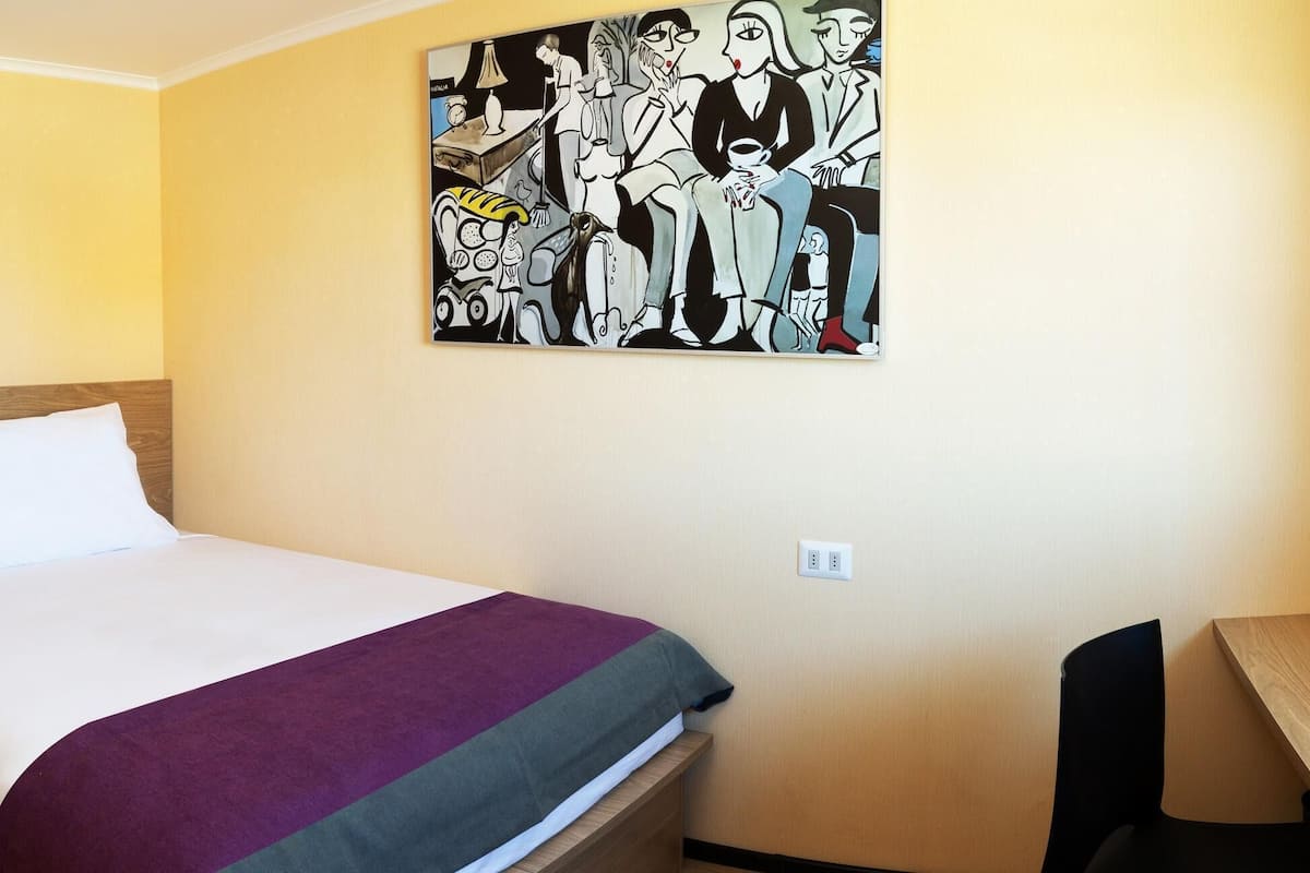Desk, free WiFi, bed sheets