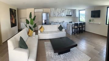 Quarto família | Área de estar | TV de tela plana 42 polegadas com canais a cabo, TV