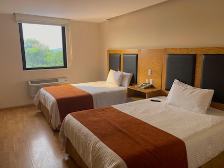 Premium bedding, down duvets, in-room safe, desk