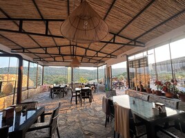 Breakfast, lunch, dinner served; local cuisine 