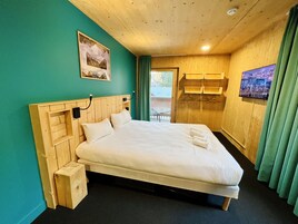 Quartos à prova de som, Wi-Fi de cortesia, roupa de cama