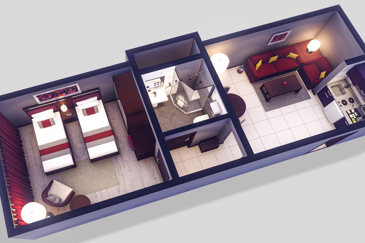 A 3D floor plan of a hotel room with a bed, a desk, a bathroom, and a living area.