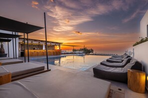 Indoor pool, 2 outdoor pools, open 10:00 AM to 8:00 PM, pool umbrellas