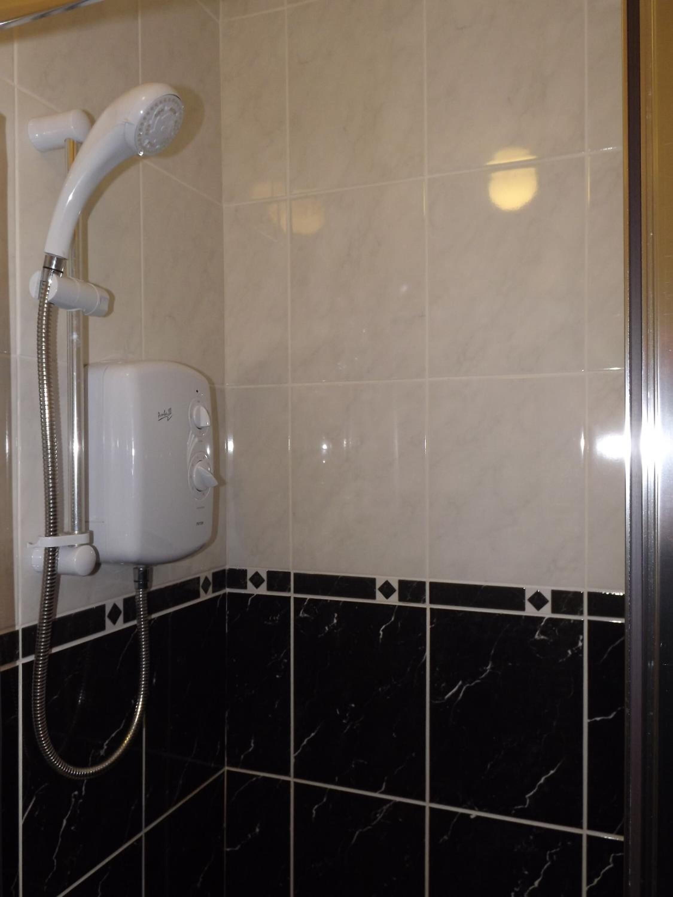 Separate bathtub and shower, free toiletries, hair dryer, towels