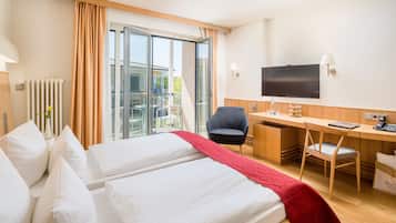 Minibar, escritorio, camas extra y wifi gratis