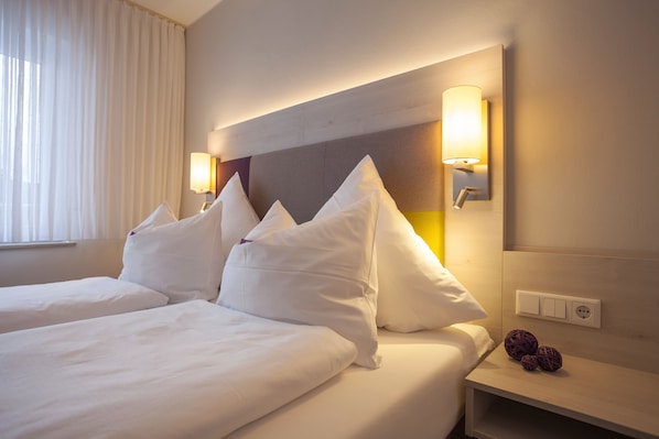 Chambre Double | Rideaux occultants, lits bébé (en supplément), Wi-Fi gratuit