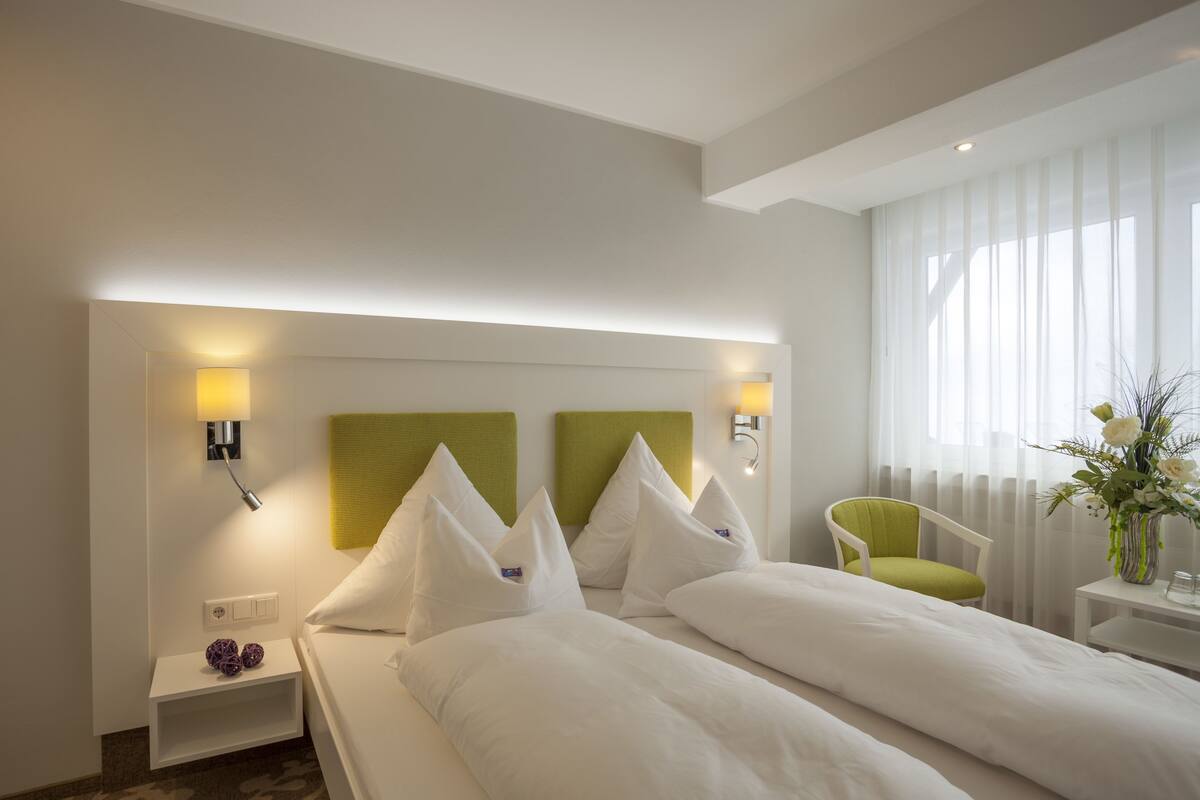 comfort double room, balcony | blackout curtains, cots/infant beds, free wifi, bed sheets