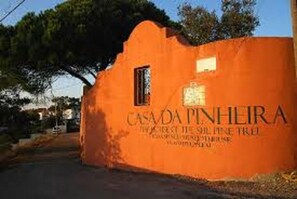 A building with the sign "CASA DA PINHEIRA" indicating it is a historical site.