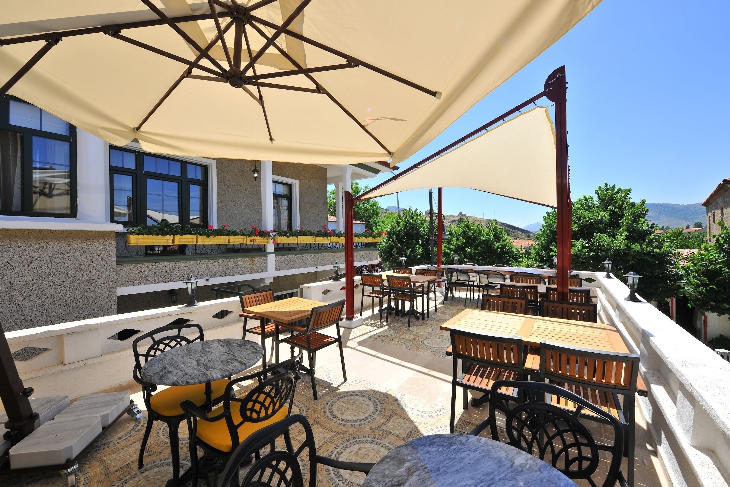 breakfast, lunch, dinner served; garden views