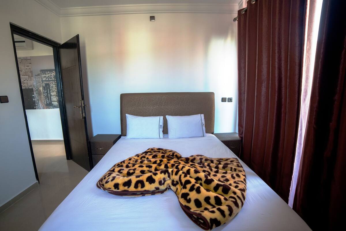 1 bedroom, blackout drapes, soundproofing, iron/ironing board