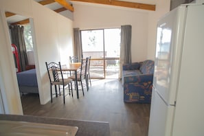 Living area - Oamaru Bay Tourist Park (Coromandel)