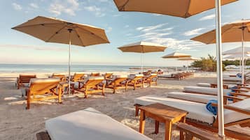 Een privéstrand, duiken, snorkelen, windsurfen