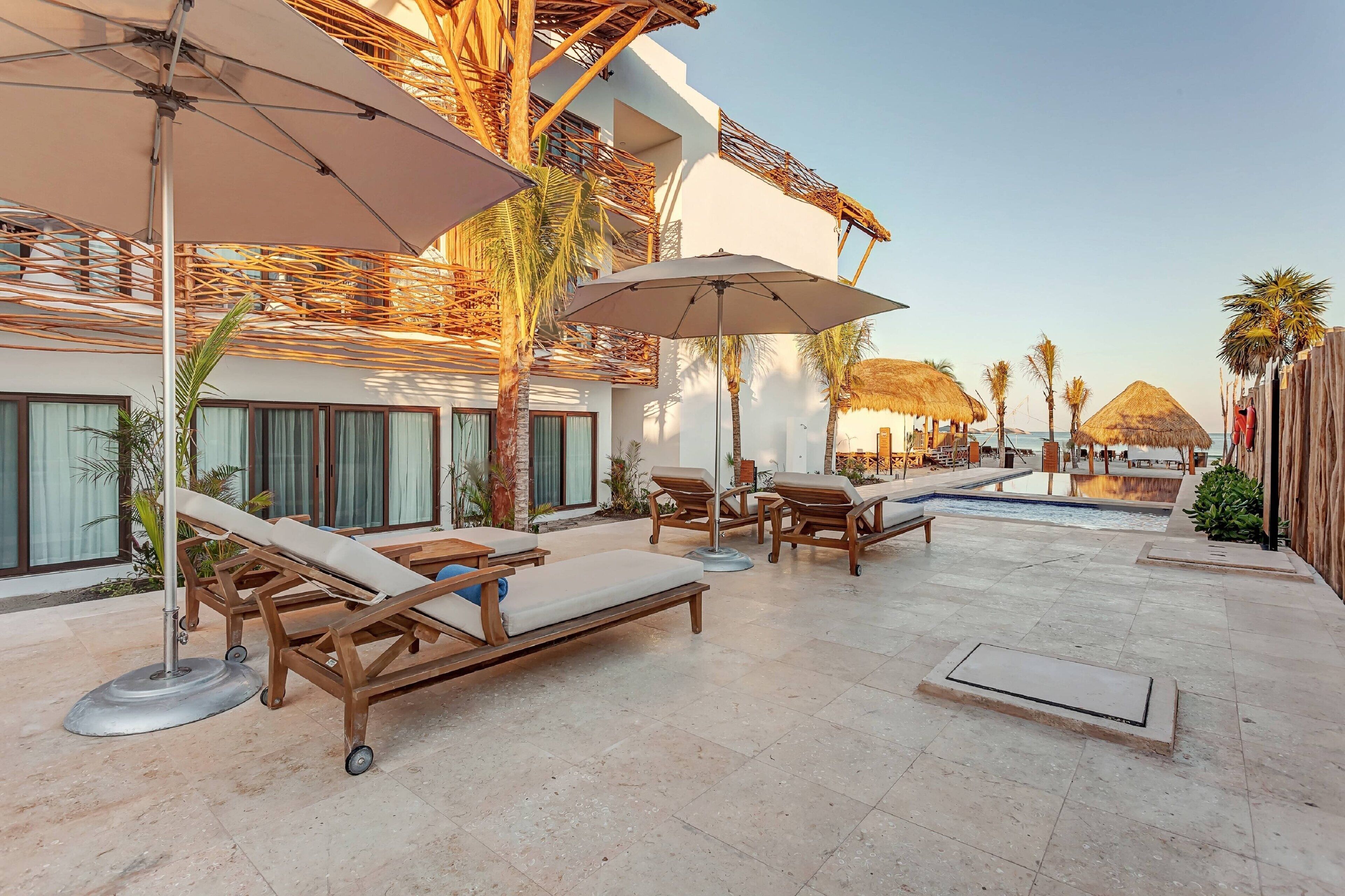 outdoor pool, pool umbrellas, pool loungers