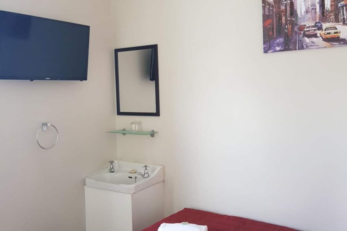 Standard Room with TV | Individually furnished, free WiFi, bed sheets