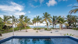 A pool area with a view of the beach and ocean. - PRIVATE BEACHFRONT PARADISE with COOK & POOL = Luxury on the Sea! (San Pedro)