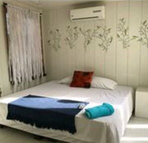 Maison Familiale, 3 chambres, coin cuisine, vue partielle sur l'océan | 3 chambres, fer et planche à repasser, Wi-Fi gratuit, draps fournis