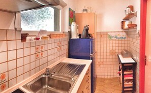 Fridge, oven, coffee/tea maker, cookware/dishes/utensils