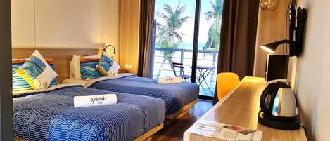 Deluxe Room, Ocean View | Minibar, in-room safe, desk, blackout curtains