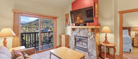 Flat-screen TV, fireplace, DVD player, video library
