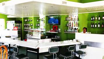 Breakfast, lunch, dinner served; international cuisine