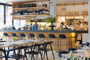 Breakfast, lunch, dinner served; local cuisine 