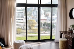 Exclusive Suite, 1 Bedroom, Balcony, Mountain View | Living area