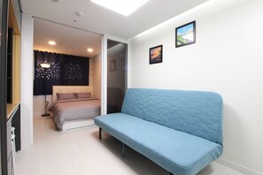 Double Room | Living area | 40-inch flat-screen TV with cable channels, TV - Stay 290 (Jeju City)