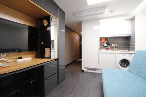 Quarto casal | Área de estar | TV de tela plana 40 polegadas com canais a cabo, TV