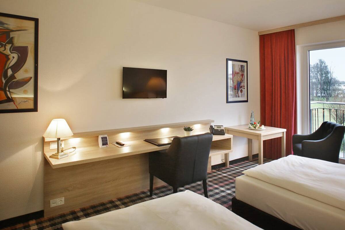 hypo-allergenic bedding, in-room safe, desk, blackout curtains