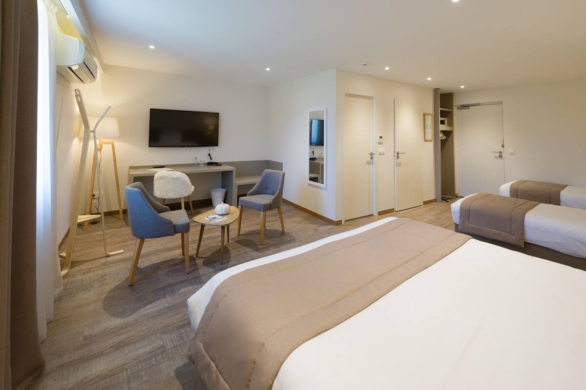 Suite junior | Ropa de cama de alta calidad y caja de seguridad en la habitación 