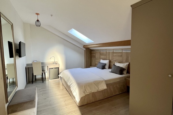 Economy tweepersoonskamer | 1 slaapkamer, een minibar, een kluis op de kamer, een bureau