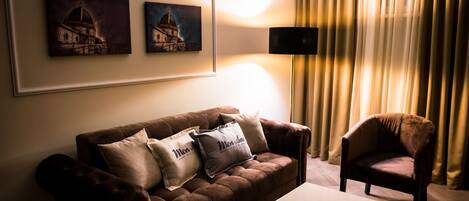 Deluxe Suite | Living room | Flat-screen TV