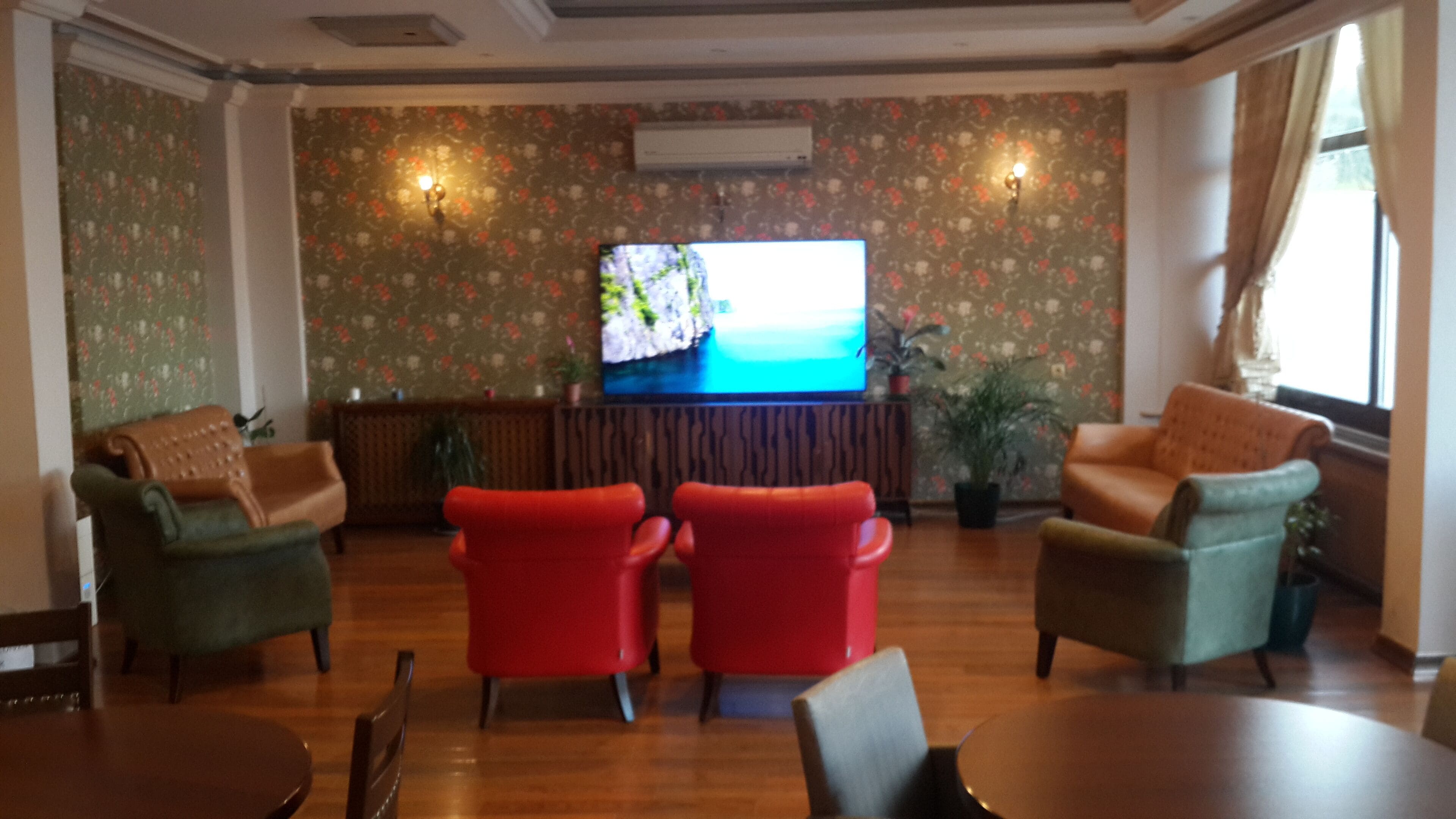 deluxe room | living area | lcd tv