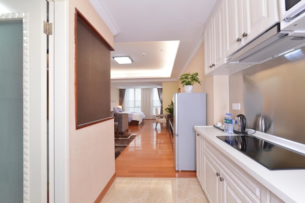 Fridge, microwave, stovetop, coffee/tea maker