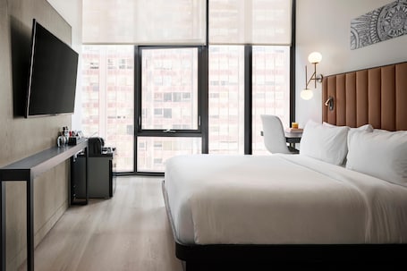 Room, 1 Queen Bed (Millennium - ADA) | In-room safe, desk, laptop workspace, blackout drapes. Arlo Chicago