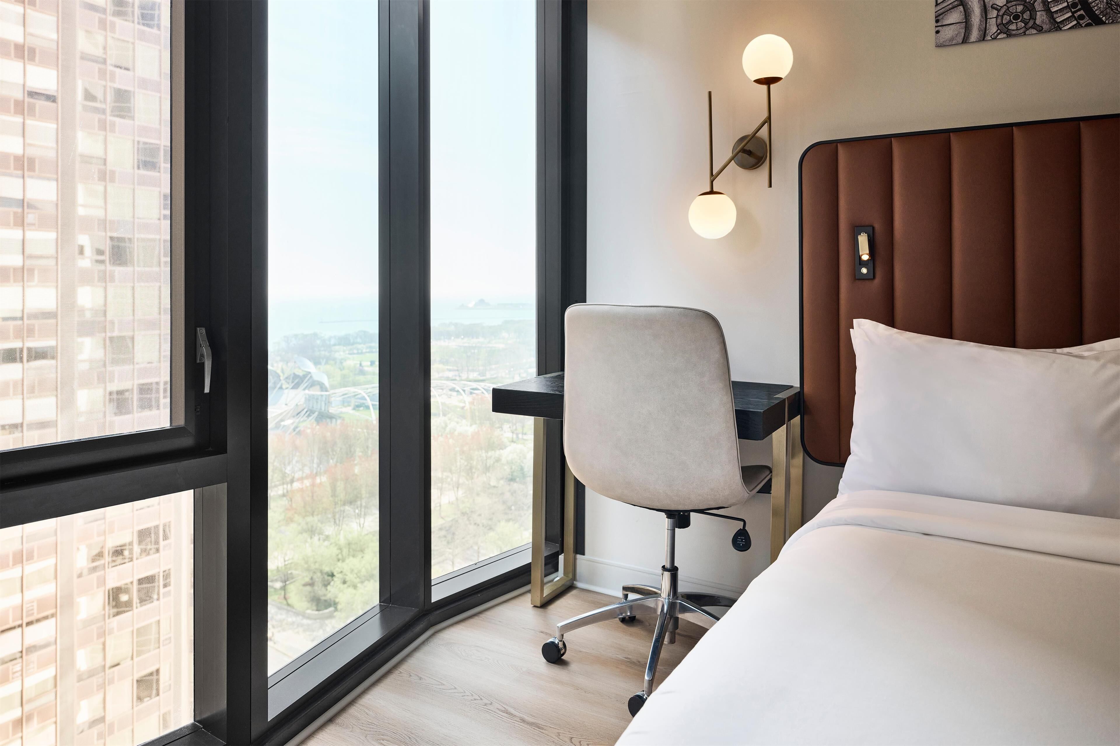 room, 1 queen bed (millennium - ada) | in-room safe, desk, laptop workspace, blackout curtains