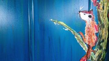 A painting of a red fox on a branch against a blue background.