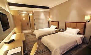Deluxe Twin Room | Minibar, in-room safe, desk, blackout curtains - Manhattan Hotel (Harbin)