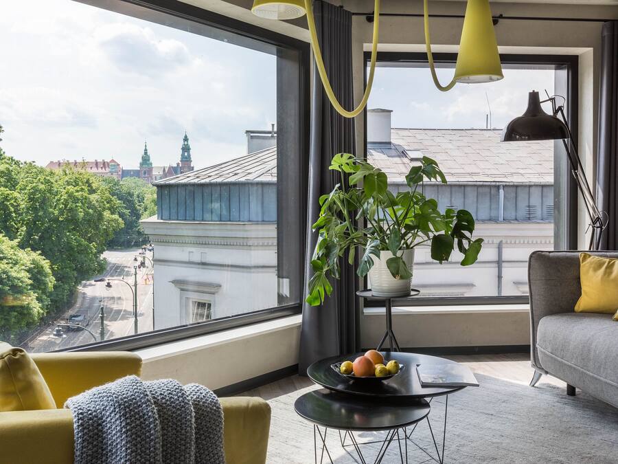 Signature Suite, 1 Bedroom, Kitchen, City View | Living area | Flat-screen TV