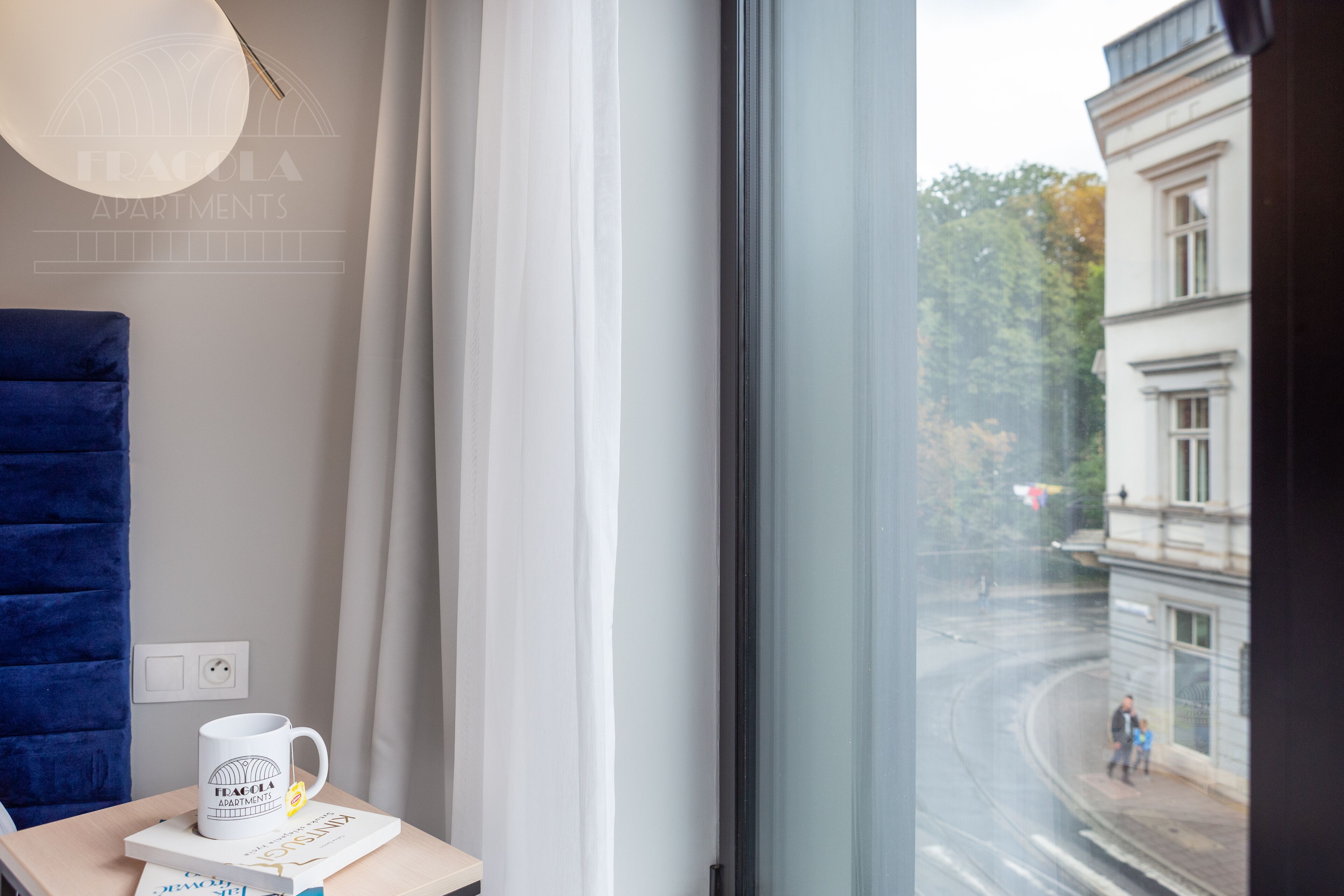 classic double room, 1 queen bed, refrigerator | living area | flat-screen tv