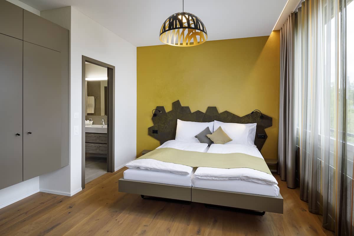 Premium bedding, in-room safe, desk, soundproofing