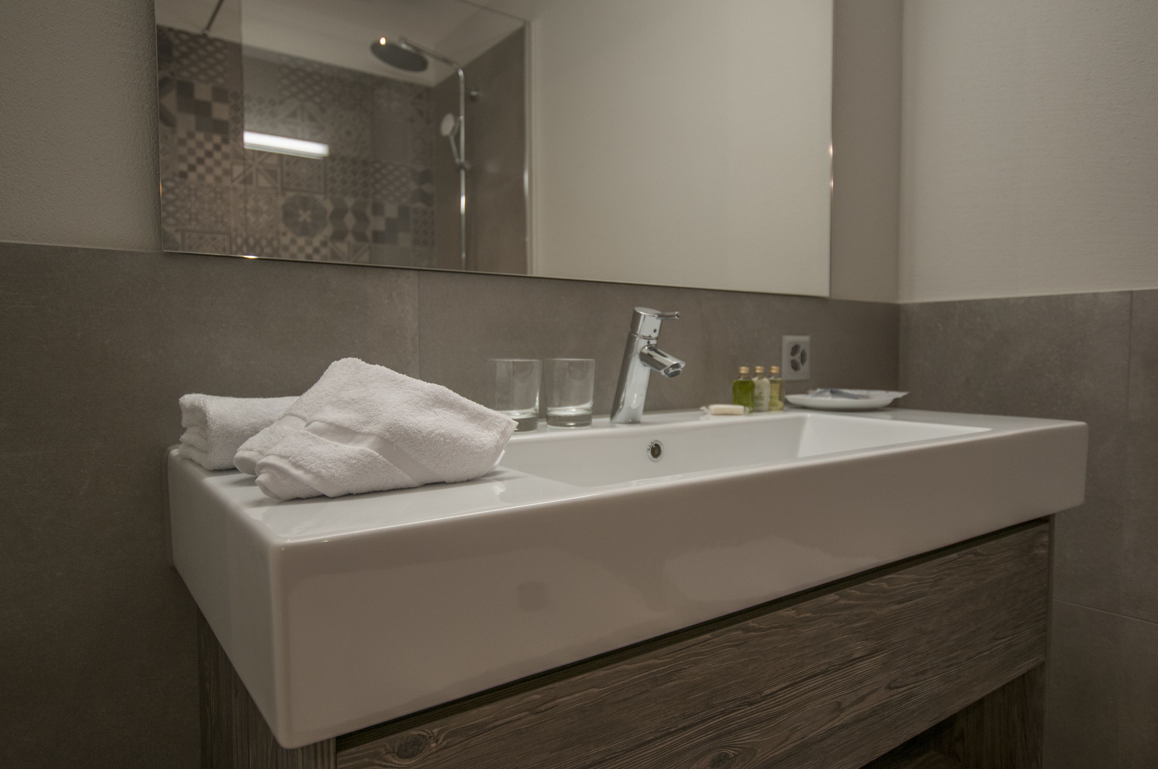 free toiletries, hair dryer, slippers, towels