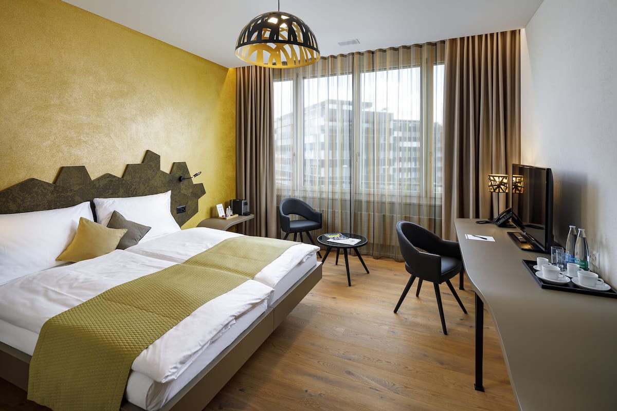 Premium bedding, in-room safe, desk, soundproofing