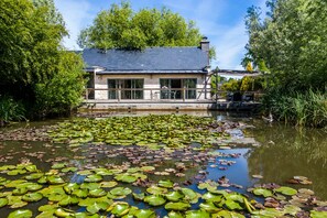 Maison sur l'eau 2 chambres LA LAGUNE | Terrasse/Patio