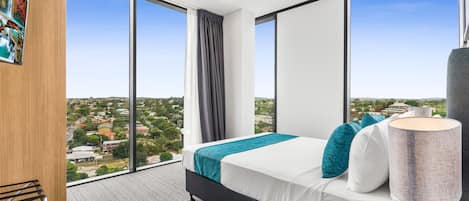 1 Bedroom Suite City View | Premium bedding, laptop workspace, blackout curtains, soundproofing