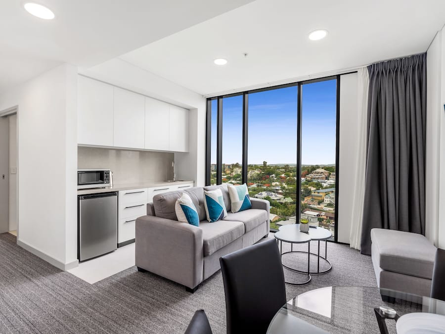 1 Bedroom Suite City View | Living area | 48-inch flat-screen TV with cable channels