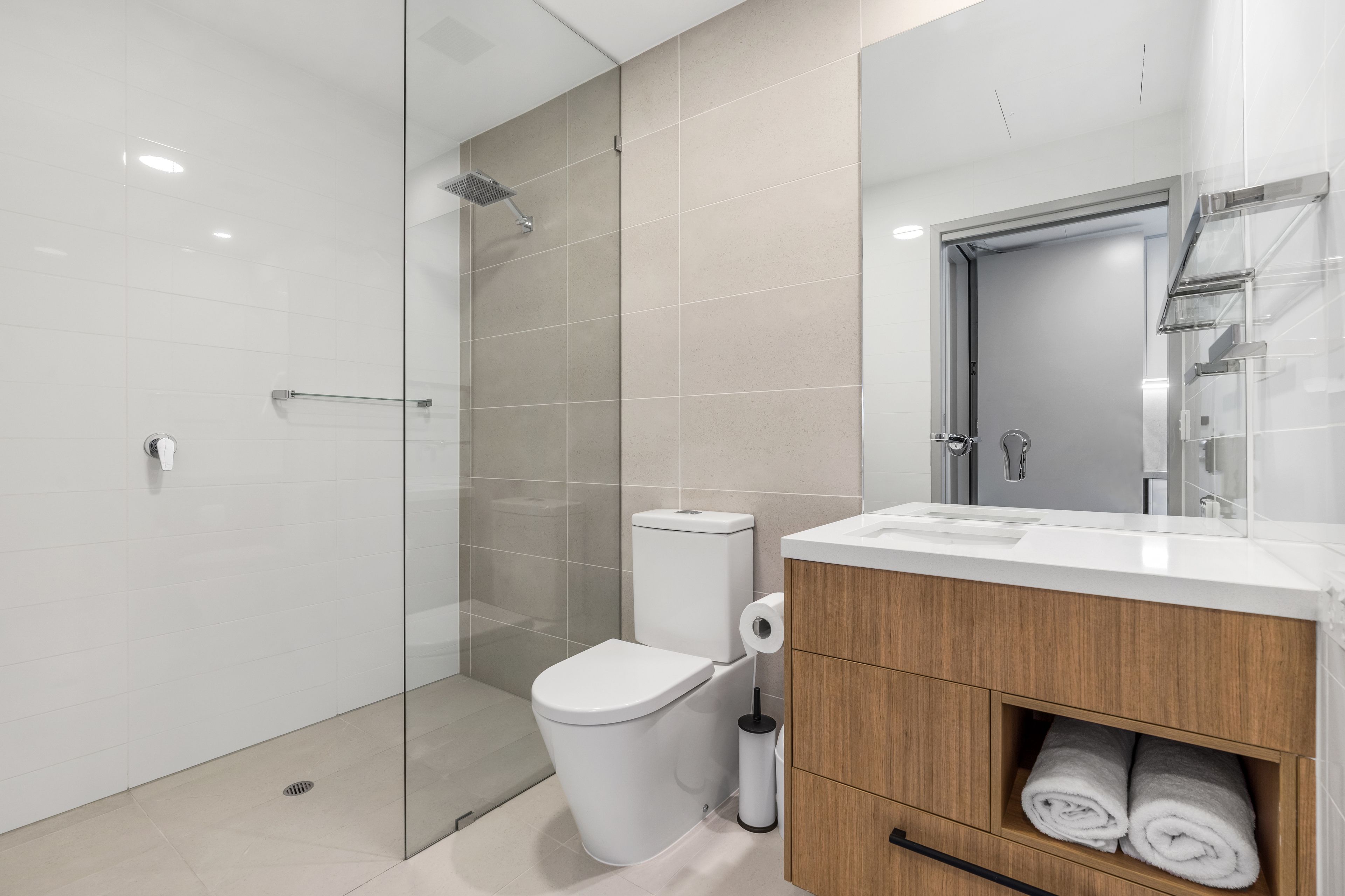 studio queen suite | bathroom | shower, eco-friendly toiletries, hair dryer, towels